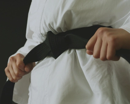 Cintura nera di Judo, immagine che si rifà a due qualità molto importanti che un vero Buffettologo deve avere: fegato e disciplina.